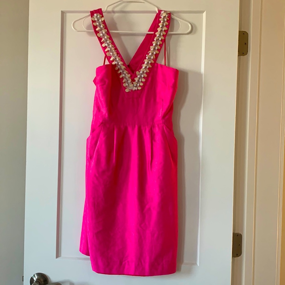 Adorable pink Kate Spade sundress with seashell neckline detail. Size 2.